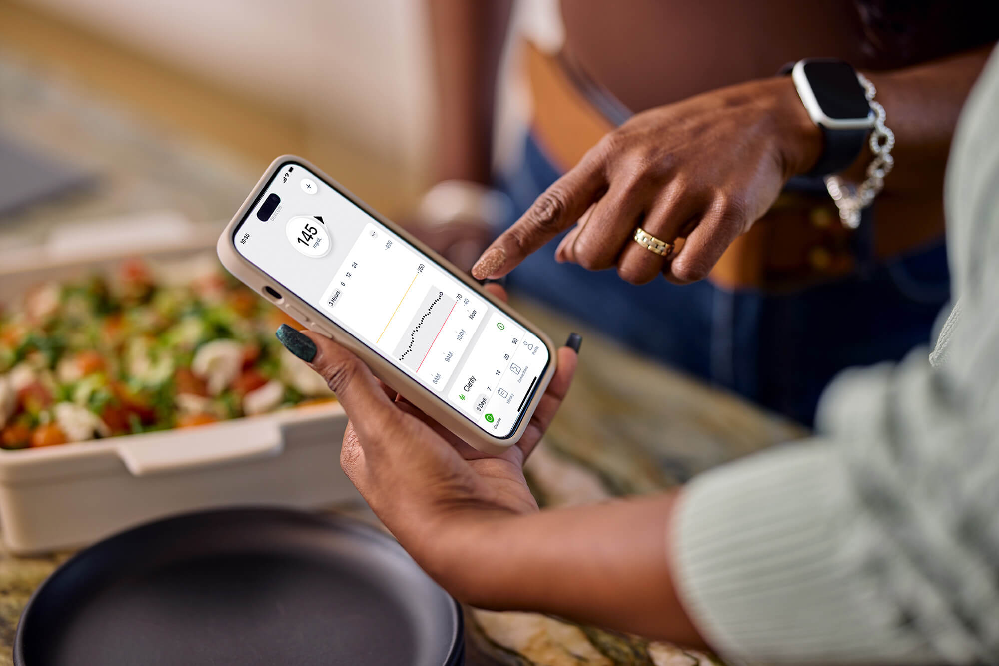 phone showing glucose readings